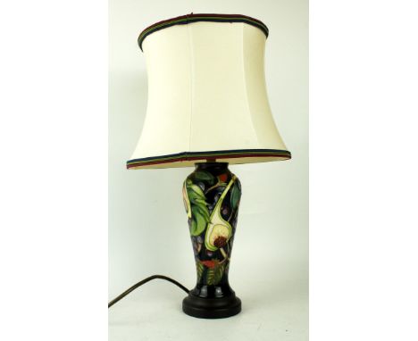 A modern Moorcroft table lamp Of tapering cylindrical form, decorated in the 'Queens Choice' pattern, designed by Emma Bosson