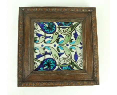 A William De Morgan floral tileDecorated in the Persian palette, impressed indistinct marks verso, 15x15cm    CONDITION REPOR