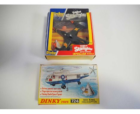 A pair of DINKY diecast aircraft models comprising 362 Trident Starfighter and 724 Sea King Helicopter, both appear complete 