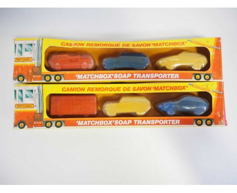 A pair of MATCHBOX 'Soap Transporters', issued circa 1982, each comprising three soaps (1x fire engine, 1x Londoner bus and e