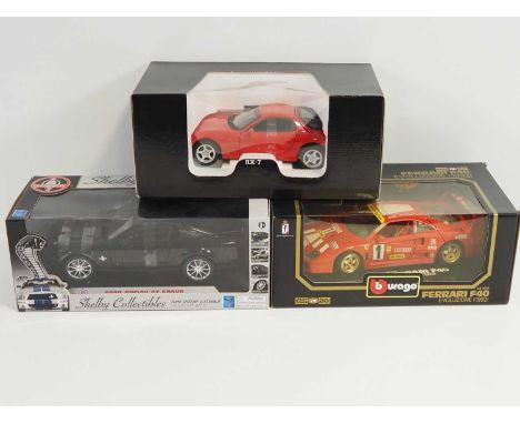 A group of 1:18 scale diecast cars by KYOSHO, BBURAGO and SHELBY COLLECTIBLES - VG/E in VG boxes (3)