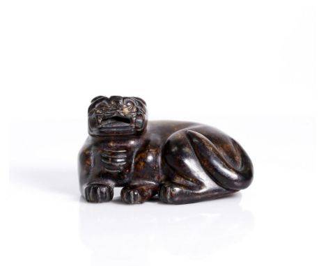 a fine, antique, russet lion jade.  late Ming or early Qing dyn.  Typical Ming style recumbent lion, cut with broad strokes, 