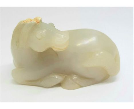 an antique, rare, Chinese, jade horse.  Qing dyn.  A wonderful, well carved, white jade, recumbent horse. The jade is high qu