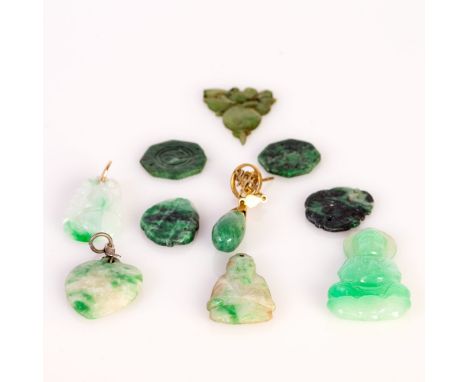 group of 10 antique, Chinese jadeite pendants, parts of a necklace, and one golden jade earing. 2 pendants are depicting a Bu