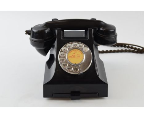 Vintage bakelite telephone and base, with wire.  
