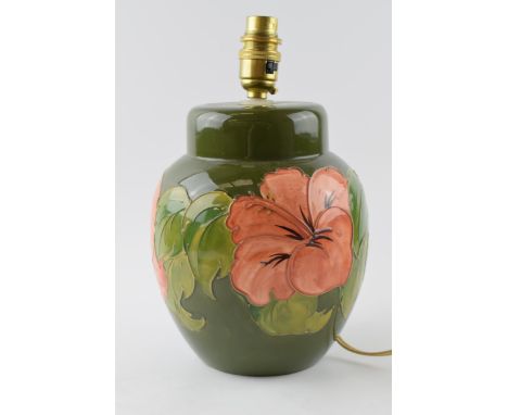 Large Moorcroft Hibsicus on green bulbous lamp base, 26cm tall inc fittings.  In good condition with no obvious damage or res