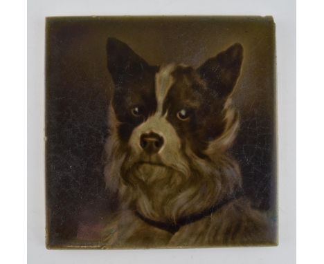 Victorian ceramic 6" tile. Portrait tile of a Terrier dog in the émaux ombrants technique, in relief with a sepia majolica gl