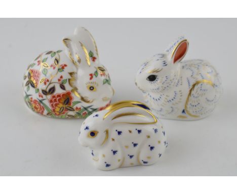 Three Royal Crown Derby paperweights, Collectors Guild Exclusives Meadow Rabbit and Bunny, red printed marks and Royal Crown 