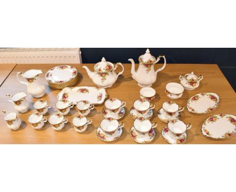 Collection of Royal Albert Old Country Rose tea ware to include 6 cups and saucers, 6 cups, 2 teapots, 3 cream jugs, sugar bo