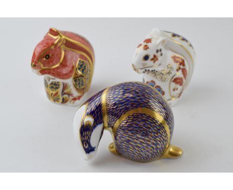 Royal Crown Derby Paperweights in the form of a Badger, a Red Squirrel and a Squirrel first quality with gold stoppers (3).  