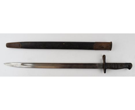 WWI Remmington 1913 pattern 10 16 bayonet. Length 58cm.  Blade in good order, handle original with some paint marks, scabbard