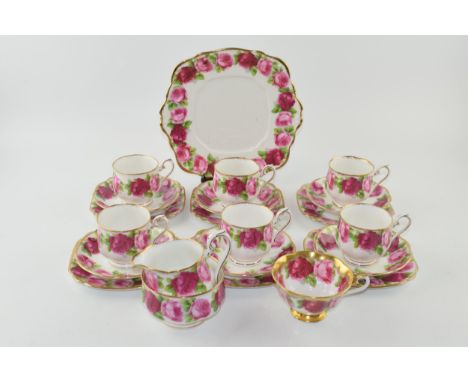 Royal Albert Old English Rose to include 6 cups, 6 saucers, 6 side plates, a Treasure Chest cup, a milk jug, a sugar bowl and