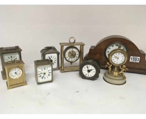 A collection of small clocks including a carriage clock an ornate gilt metal clock and Edwardian mantel clock (a lot)