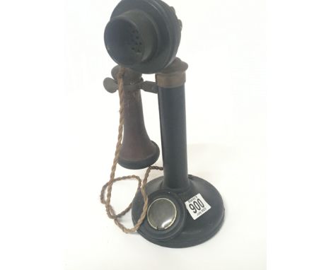 An original Antique circa 1920 candle stick telephone. Height 31cm.