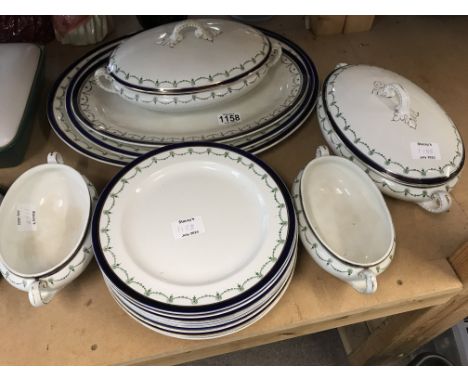 A 1920s dinner ceramic set with plates and tureens.