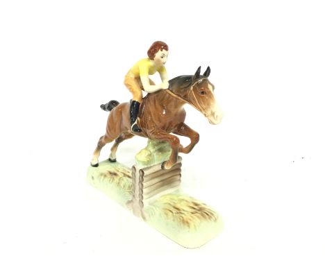 A Beswick equestrian ceramic figure, circa 1950s/60s. No obvious damage or restoration 24cm tall. Postage cat D