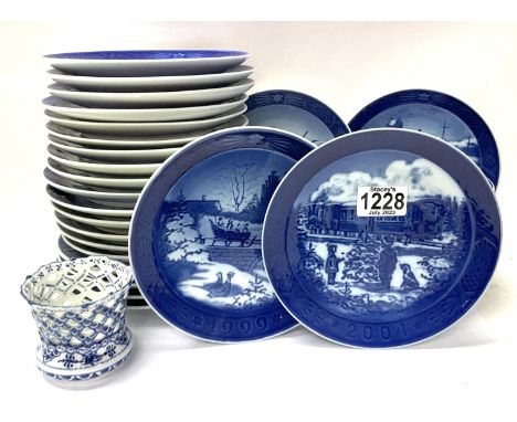 32 Royal Copenhagen collectors plates together with a small Copenhagen pierced vase. (D).