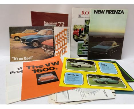 A collection of vintage automobile magazines. (B)