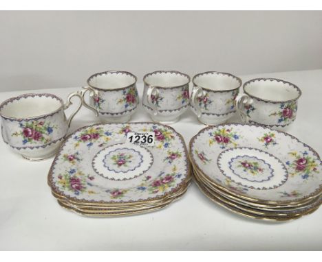 A Royal Albert English porcelain part tea set five cups saucers and side plates.