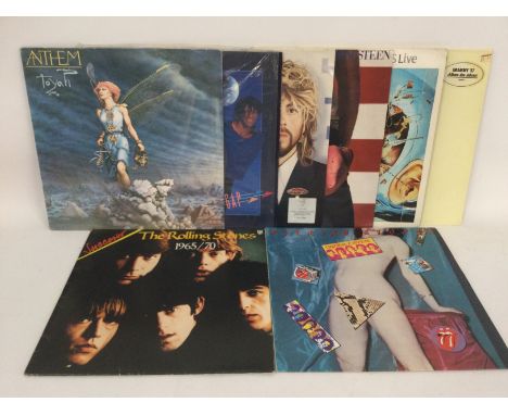 A collection of LPs, 7inch singles and EPs by various artists including The Beatles, Rolling Stones, David Bowie, Prince and 