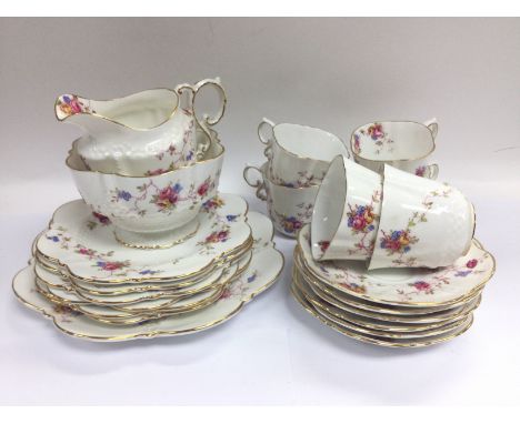 An Aynsley tea set with hand painted floral decoration on a white ground. Shipping category D.