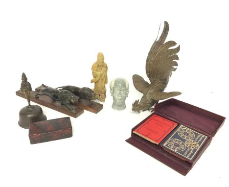 A collection of ornaments including a pair of carved horn lions, a antique snuff box, a set of cased Bezique The Water Jump v