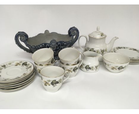 A Royal Doulton Larchmont pattern tea set and a 19th century continental stoneware dish.