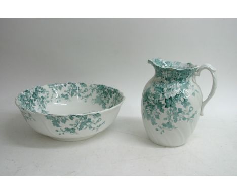 A blue and white ceramic jug and bowl.