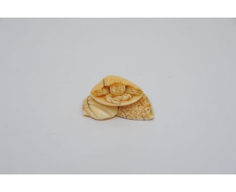 A Carved 19th century Japanese Ivory Netsuke in the form of a crab.