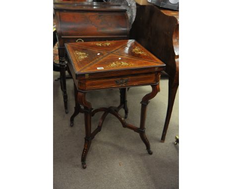 A quality Edwardian inlaid rosewood envelope card table, the hinged qutered top above a single drawer with square tapering le