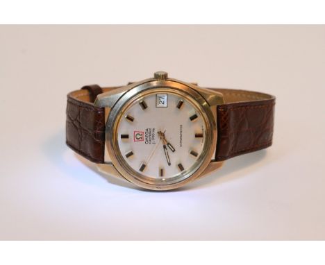 A cased gents Omega F300 Electronic chronometer watch with paperwork.