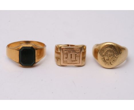 Two 18ct gold Signet rings 24 grams and one other ring unmarked