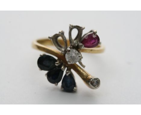 A 9ct gold, diamond, sapphire and ruby ring (missing two stones), approx 3.3g and size between G and H.