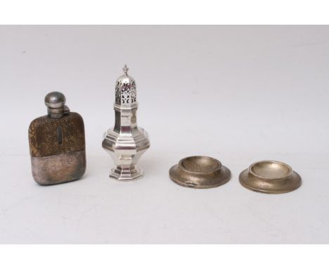 A Silver sugar caster, Sheffield hallmarks, A pair of silver ash trays and a silver plated chip flask. 