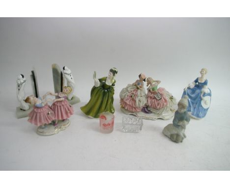 A collection of Lladro and Doulton figures and other ceramic figures