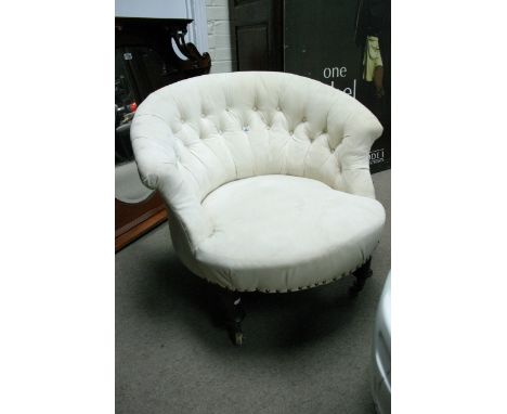 A button back occasional chair on turned legs 