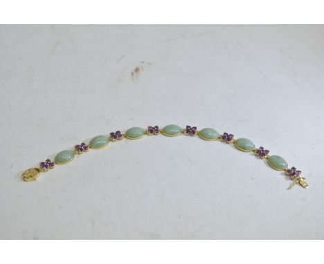 A 14k gold jade and amethyst bracelet, approx length 18.5cm.