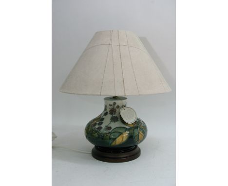 A Moorcroft blackberry pattern table lamp. Approx 40cm