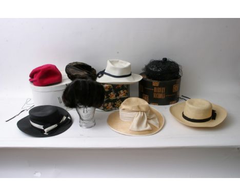 A collection of vintage hats including a Christian Dior black woven example plus vintage coats