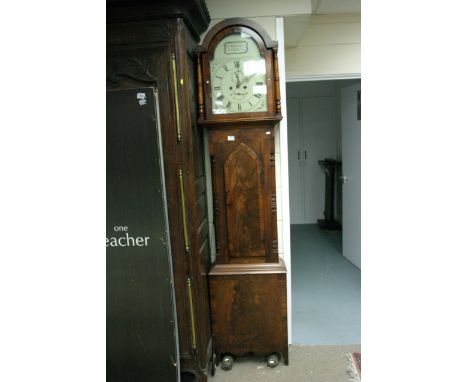 A Victorian mahogany long case clock, the painted arched dial with Roman numerals