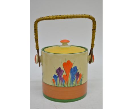 A Clarice Cliff biscuit barrel decorated with crocus pattern