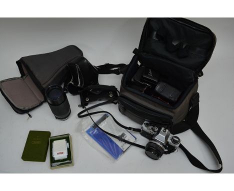 A cased vintage camera and camera accessories (2)