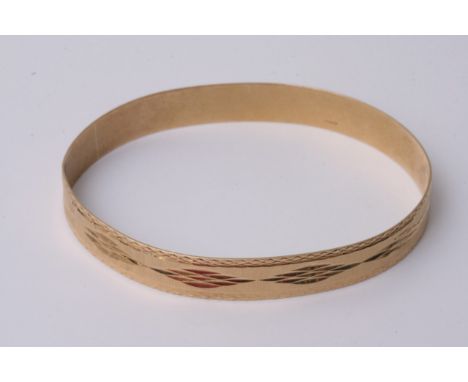 A bright cut 9ct gold bangle 12g approx 