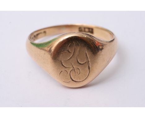 A Gents 9ct gold signet ring, approx 6.3g and size R.