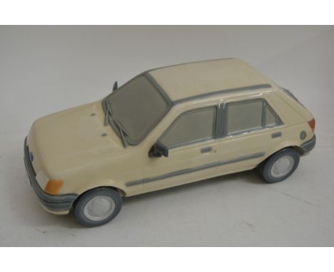 A Lladro model of a Ford Fiesta