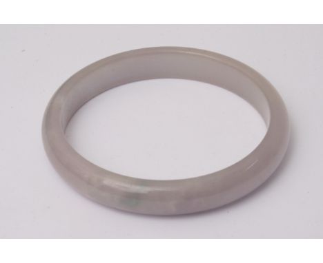 A jade bangle with grey and purple colour