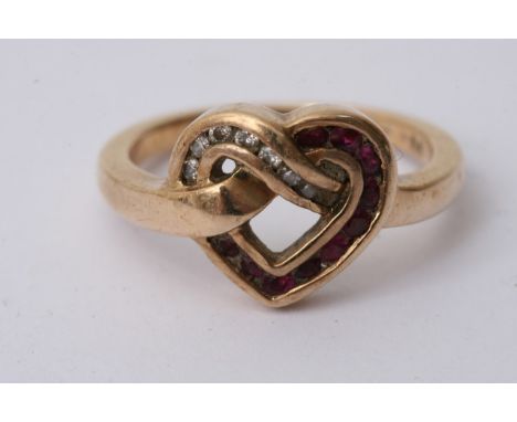 An unusual gold entwined heart ring set with ruby and diamond chips