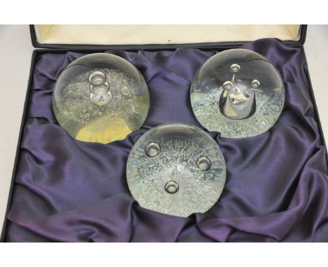 A boxed limited edition set of Caithness 'Trio' paperweights designed by Colin Tarris. Number 80 of 750 with certificate