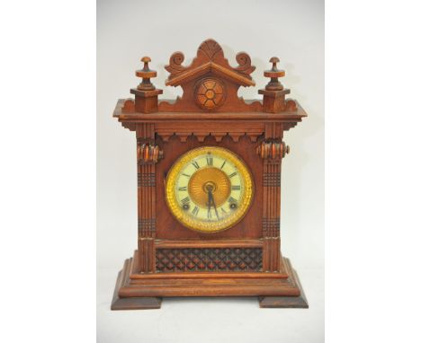 An Ansonia mantel clock with enamel chapter ring. Approx height 38cm.