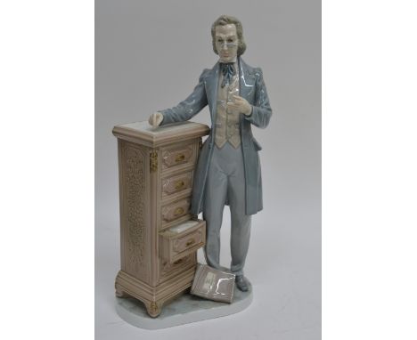 A large Lladro figure of a stately gentleman, slightly a/f, a Spode blue and white biscuit barrel and meat plate of similar t